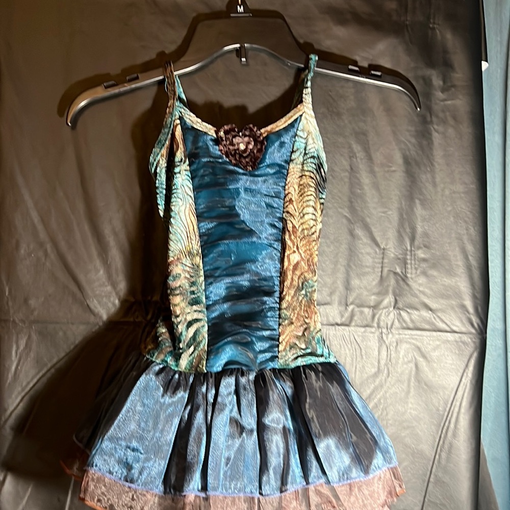 Eye catching skater costume in sea foam colors.
